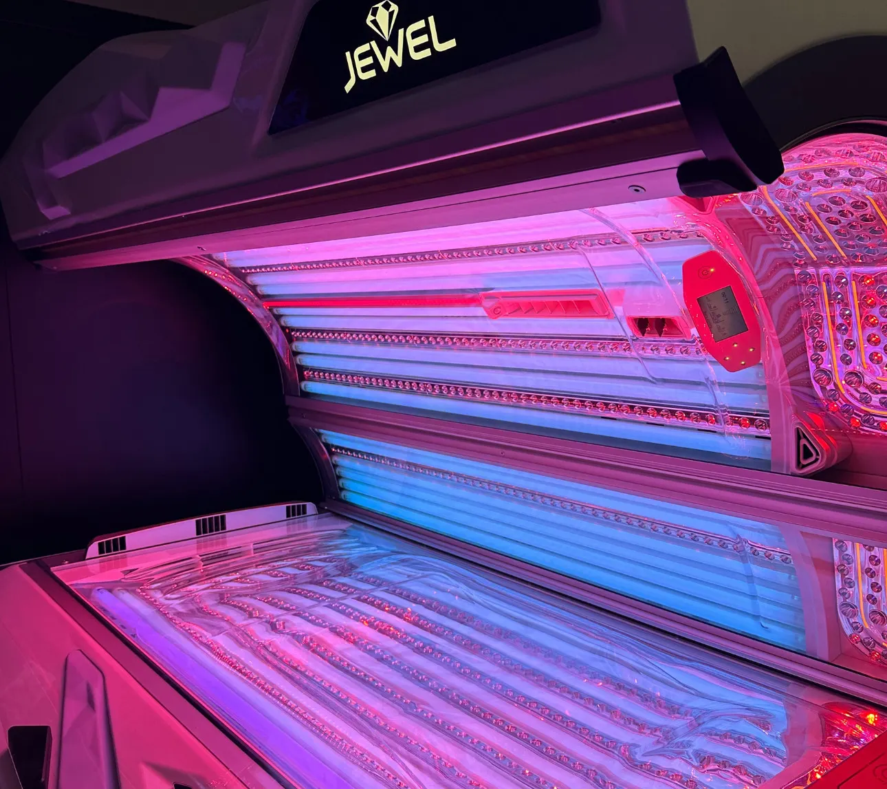 The Jewel's open canopy with its logo and red LED face tanner lit