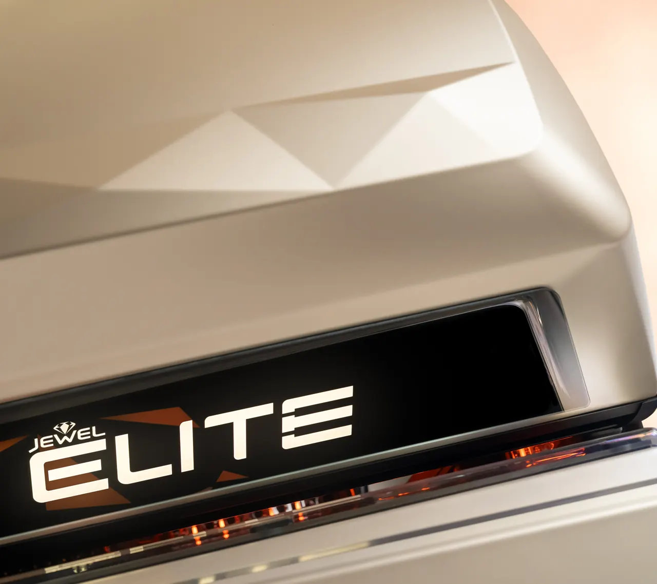 The lit Jewel Elite badge on the front of the canopy