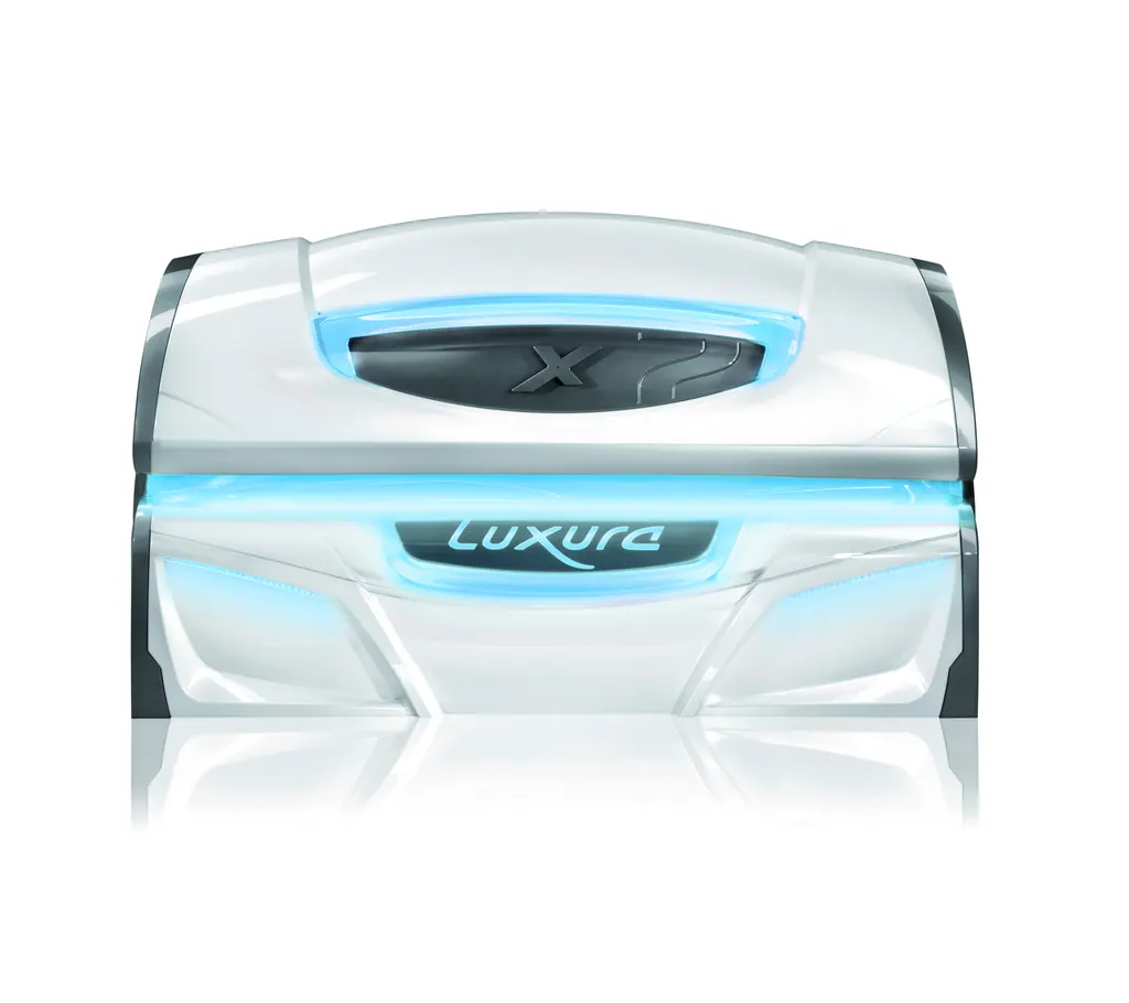 A Luxura X7 lay-down sunbed with blue ambient lighting