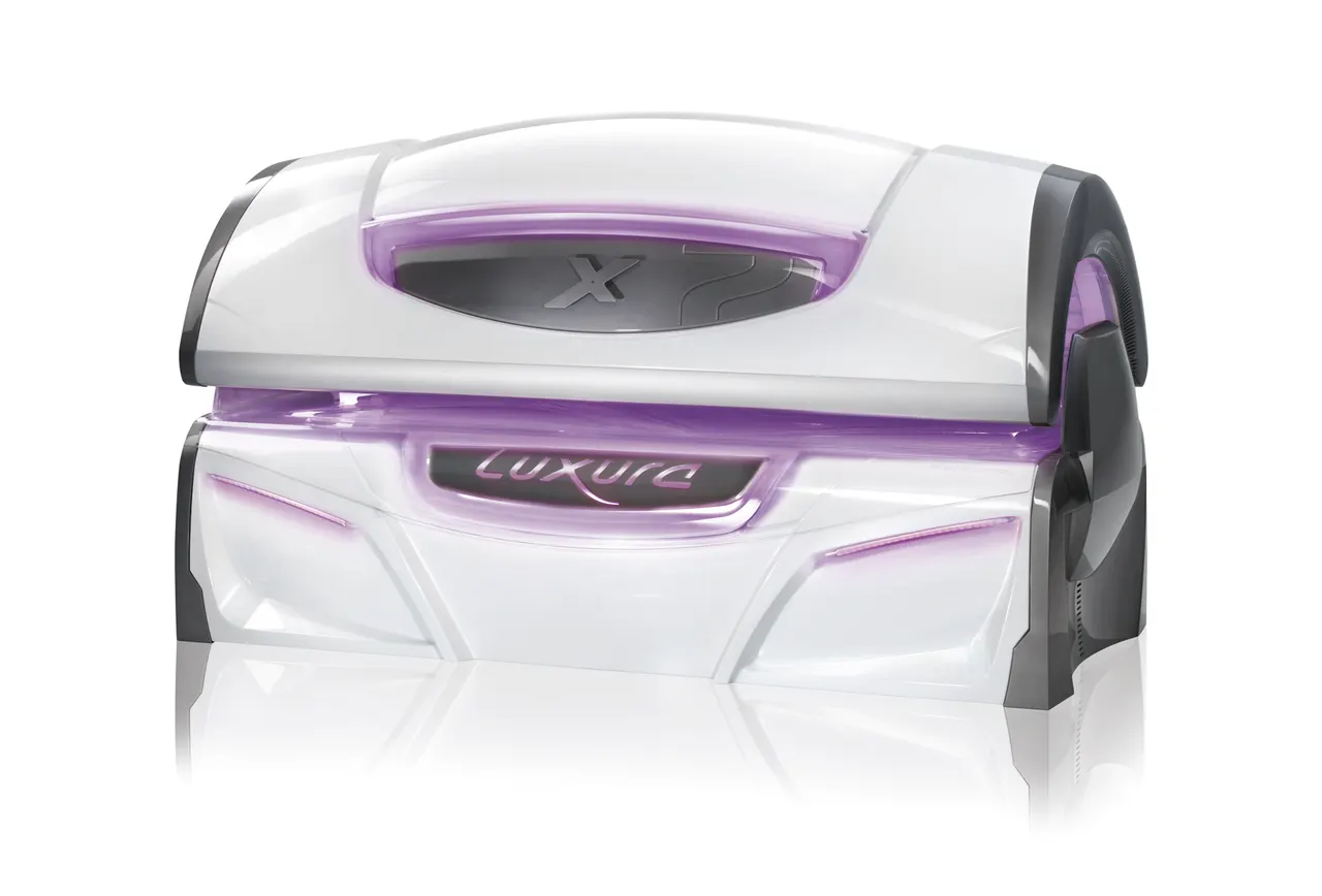 A Crystal White Luxura X7, closed, seen from three-quarters with purple Ambient FlowLight around the canopy and bench