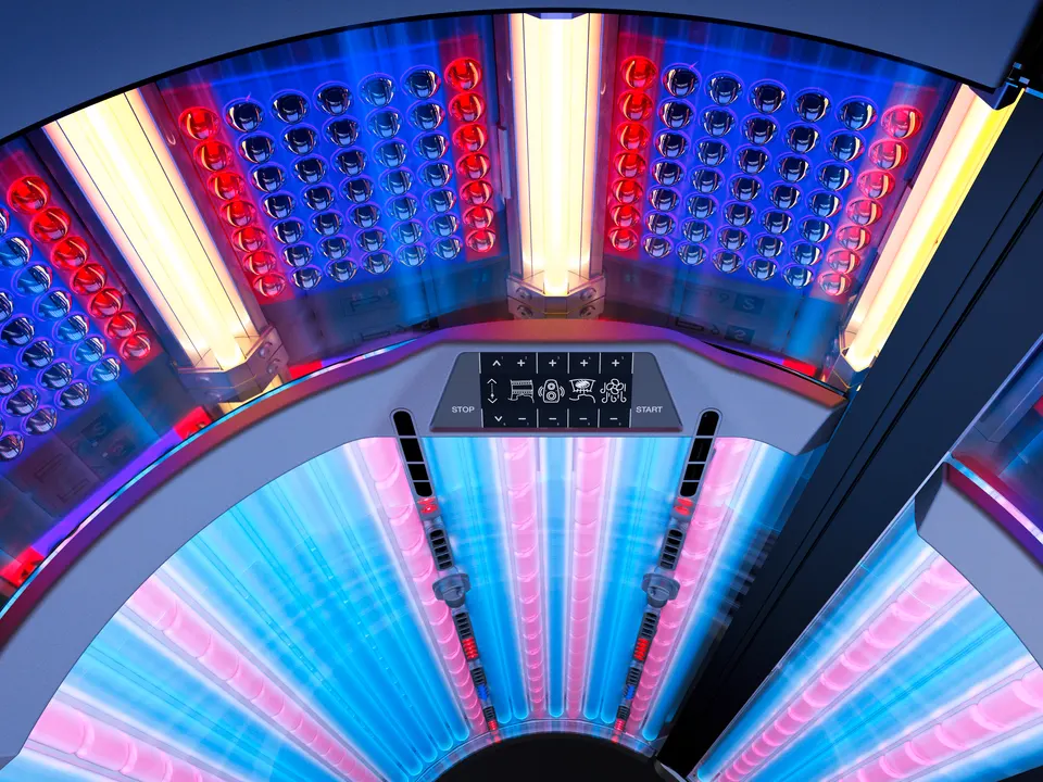 Looking up into the P9S canopy: SunSphere facial panels of blue and red LEDs either side of yellow UV-B lamps, above the inside control panel