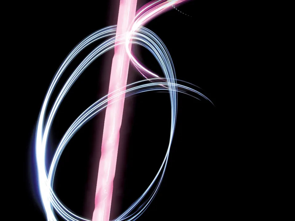 A twisted tube glowing pink on black, with trails of white light spiralling around it